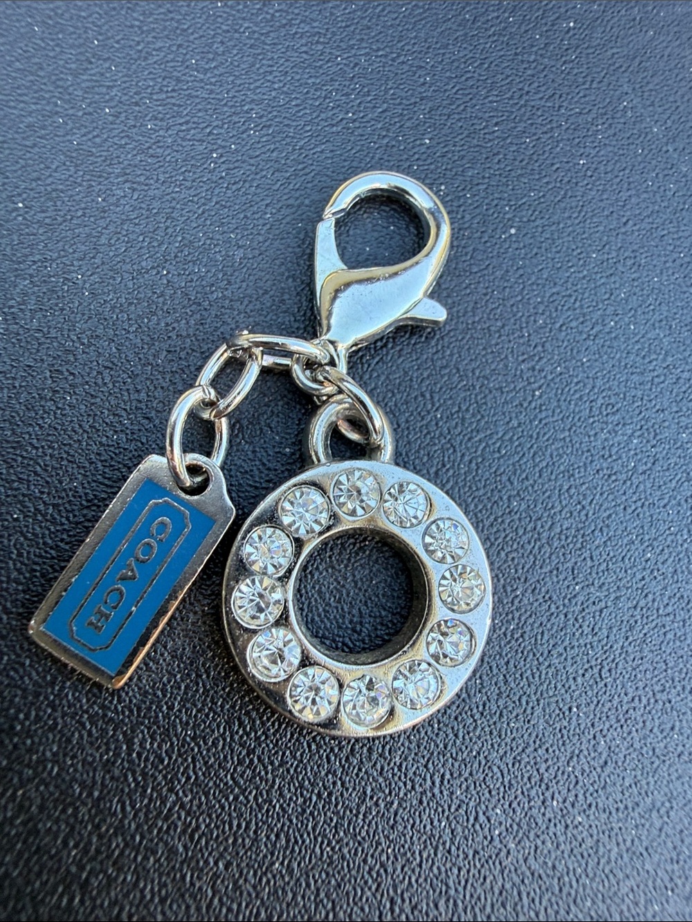 Coach Silver Crystal Circle Charm with Blue Enamel Tag